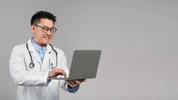 Glad Smiling Confident Middle Aged Asian Doctor White Coat Glasses — Stock Photo, Image