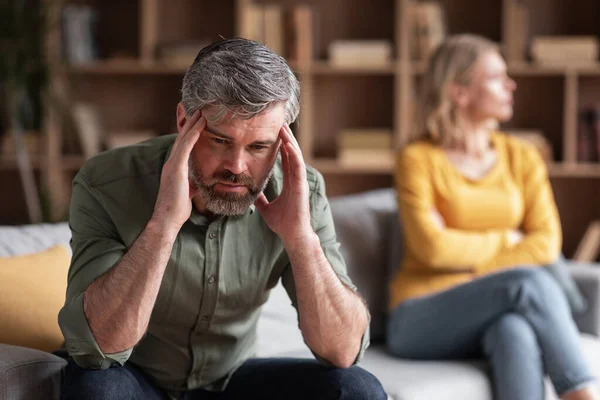 Couple Misunderstanding Depressed Middle Aged Man Sitting Upset Argue Wife — Zdjęcie stockowe