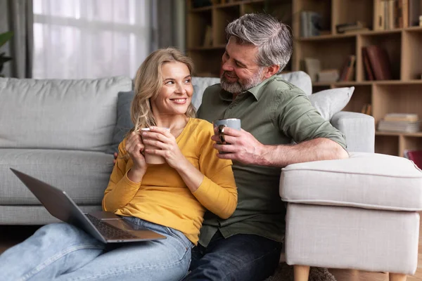 Weekend Pastime Happy Middle Aged Couple Resting Laptop Coffee Living — Stockfoto