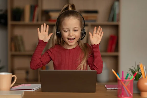 Joyful Schoolgirl Video Calling Laptop Waving Hands Computer Having Online — Fotografia de Stock