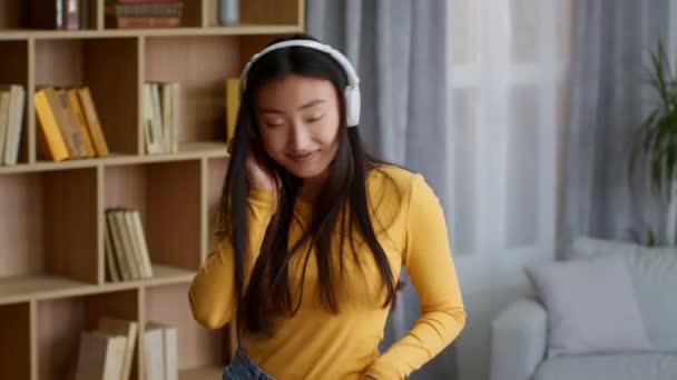 Disco Home Young Carefree Asian Lady Wearing Headphones Dancing Living — Video Stock