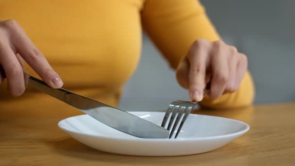 Poverty Concept Hungry Unrecognizable Lady Cutting Imaginable Food Knife Fork — 图库视频影像