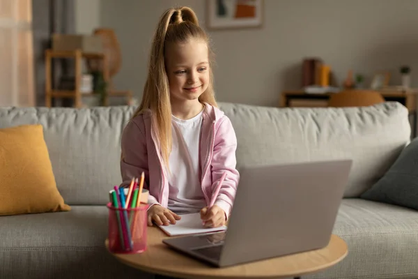 Remote Learning School Girl Using Laptop Computer Doing Homework Writing — 图库照片