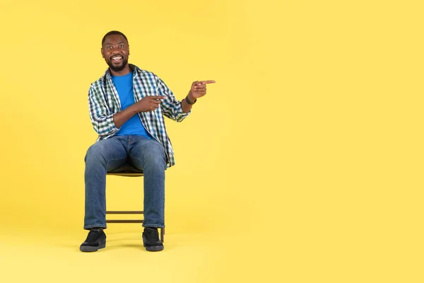 Cheerful African American Male Pointing Fingers Aside Empty Space Advertising —  Fotos de Stock