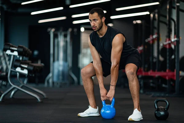 Motivated Young Black Man Training Kettlebell Modern Gym Interior Handsome — Stock fotografie