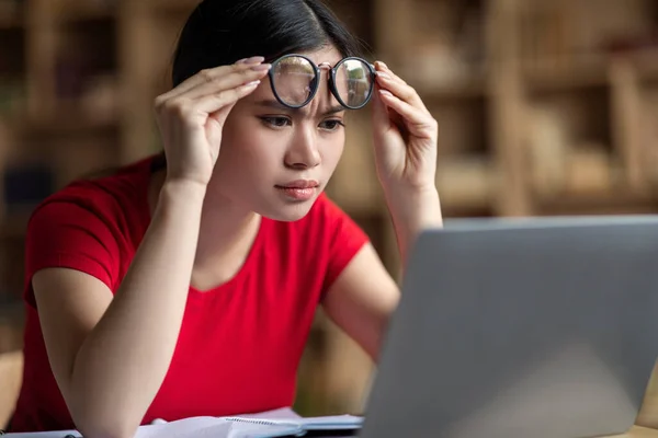 Concentrated Smart Teen Korean Female Student Takes Glasses Watch Online — Fotografia de Stock