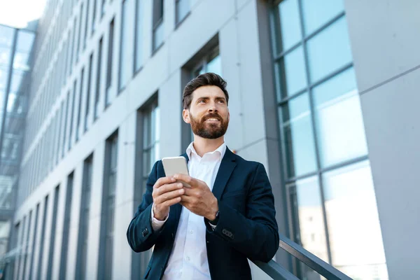 Confident Millennial Attractive Caucasian Businessman Beard Suit Typing Smartphone Looking — Fotografia de Stock