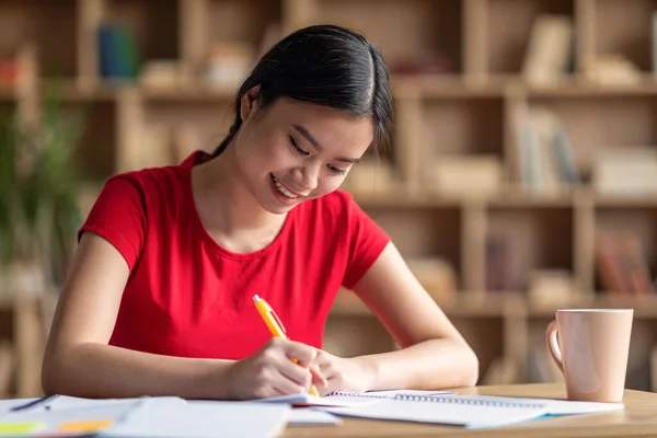 Cheerful Pretty Teenage Japanese Female Doing Homework Alone Enjoy Lesson — Foto de Stock