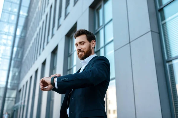 Smiling Confident Handsome Young European Male Beard Suit Looks Watch — Foto de Stock