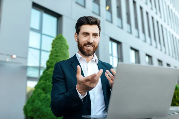 Smiling Millennial Caucasian Businessman Suit Beard Working Laptop Has Video — Stock Fotó