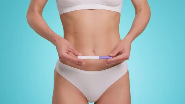 Gestation Concept Unrecognizable Woman Underwear Holding Pregnancy Test Her Stomach — стоковое видео