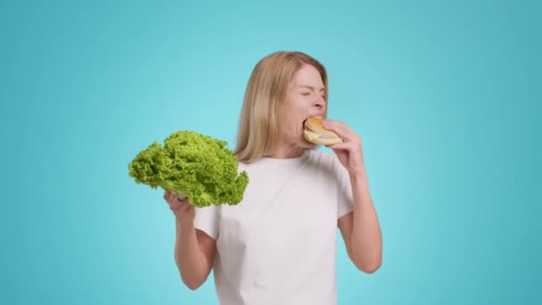 Hard Nutrition Decision Middle Aged Woman Making Choice Lettuce Salad — 图库视频影像