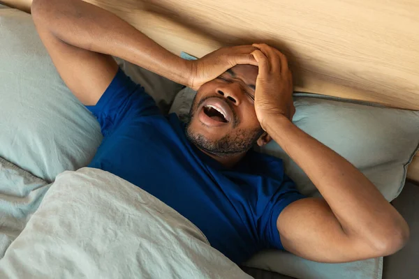 Black Man Awakening Yawning Rubbing Eyes Good Sleep Lying Bed — 스톡 사진