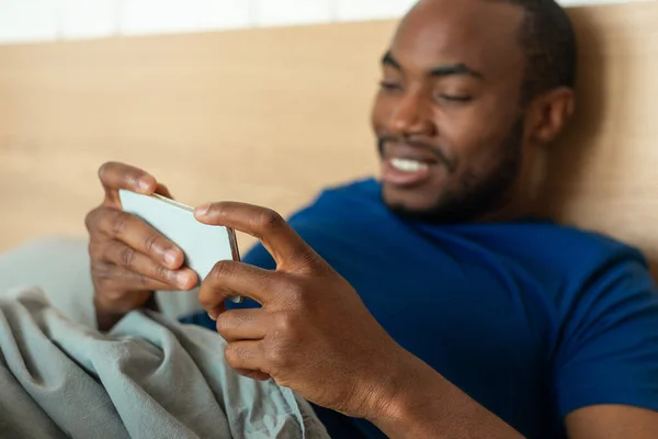 Happy Black Male Using Smartphone Playing Mobile Games Online Having — Foto de Stock