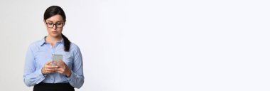 Business App. Long Horizontal Banner With Young Businesswoman Using Modern Smarphone, Confident Female Entrepreneur With Mobile Phone In Hands Posing Over White Background, Panorama With Copy Space