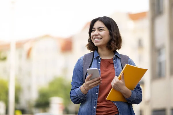 Cheerful Arab Female Student Smartphone Workbooks Standing Outdoors Happy Young — Stockfoto