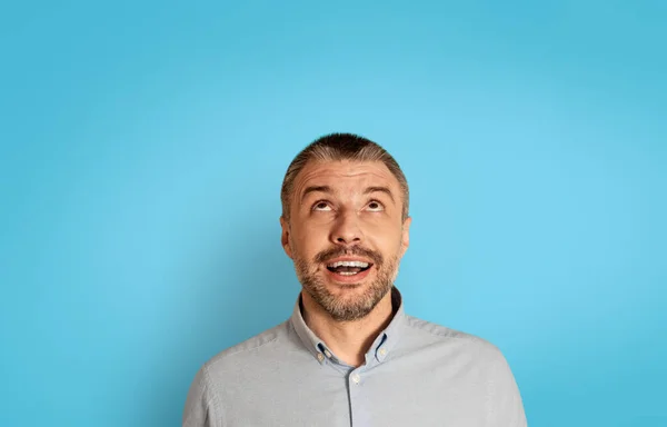 Portrait Excited Mature Man Looking Posing Blue Studio Background Middle — Stock Fotó