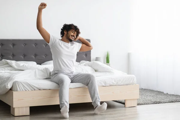 Cool Attractive Millennial Indian Guy Stretching Bed Home Young Man — Foto Stock