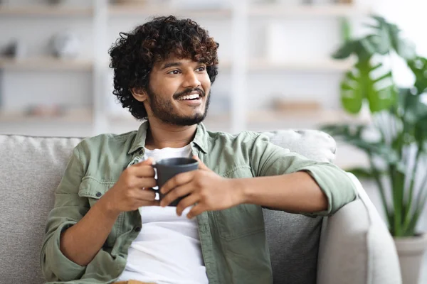 Handsome Young Guy Curly Hair Sitting Couch Cozy Living Room — 스톡 사진