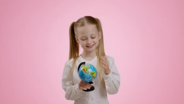 Travel Planning Cute Little Girl Spinning Globe Choosing Direction Anticipating — Vídeos de Stock