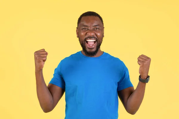 Joyful Black Guy Shaking Fists Joy Gesturing Yes Shouting Looking — Zdjęcie stockowe