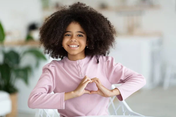 Cute Black School Girl Adorable Bushy Hair Showing Heart Symbol — Foto de Stock