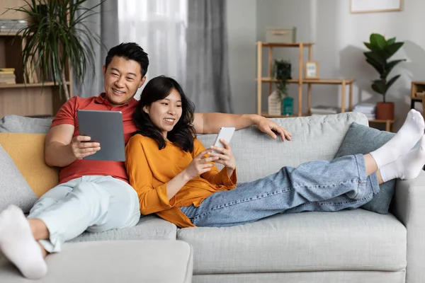 Relaxed Asian Couple Chilling Together Weekend Home Happy Man Woman — Foto Stock