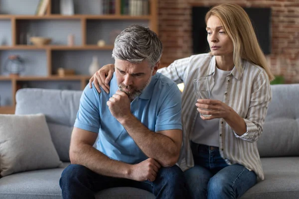 Upset Adult Caucasian Wife Calm Husband Gives Glass Water Man — Stock fotografie