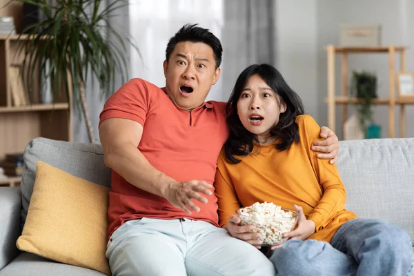 Thrilled Korean Man Woman Watching Spooky Movie Home Middle Aged — Fotografia de Stock