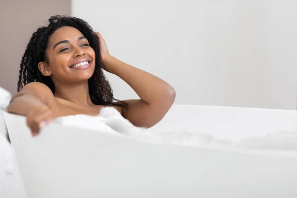 Pamper Time Happy Black Female Relaxing Bathtub Foam Home Smiling — Stock Fotó