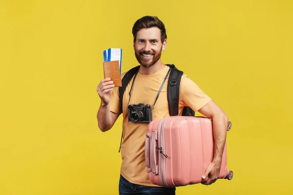 Vacation Concept Excited Male Tourist Wearing Backpack Holding Suitcase Passport — Stock fotografie