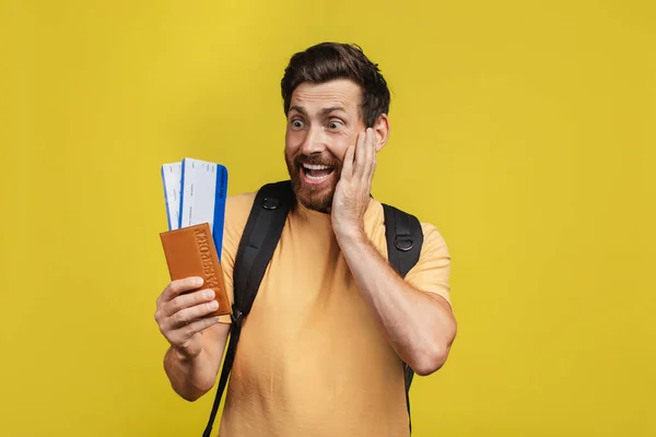 Finally Vacation Overjoyed Man Looking Passport Flight Tickets Touching Cheek — Stock fotografie