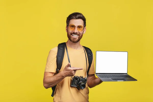 Book Your Tour Online Happy Male Traveler Backpack Showing Laptop — Stockfoto