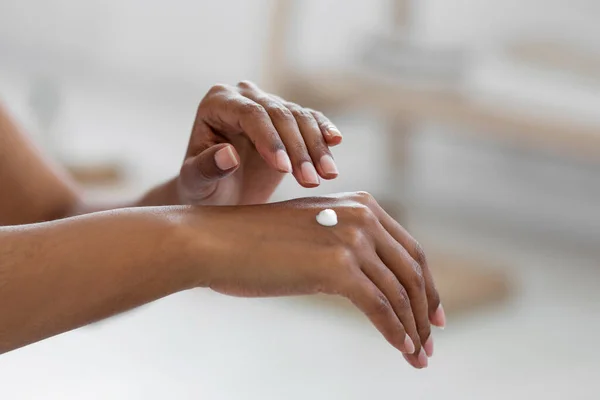 Closeup Shot Black Lady Applying Drop Moisturising Cream Hands Cropped — Zdjęcie stockowe