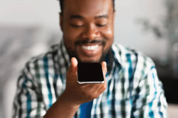 Happy Black Man Using Voice Assistant Application Mobile Phone Sitting — Foto de Stock