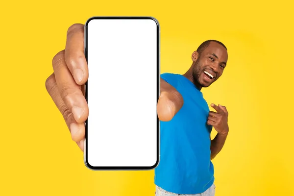 Excited Black Male Holding Cellphone Large Blank Screen Posing Advertising — Fotografia de Stock