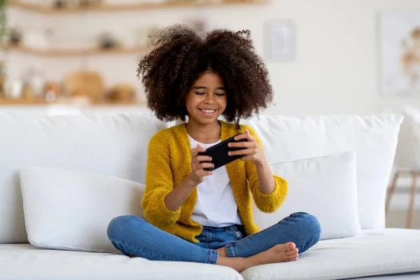 Happy Black Kid Playing Video Games Mobile Phone Home Cheerful — Foto Stock