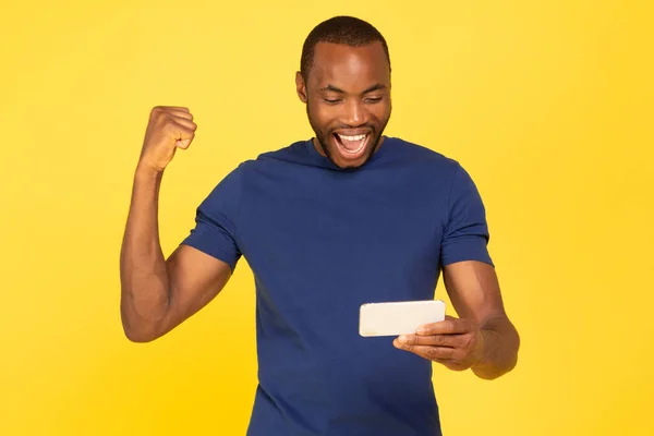 Joyful African American Man Using Phone Gesturing Yes Posing Standing — 图库照片