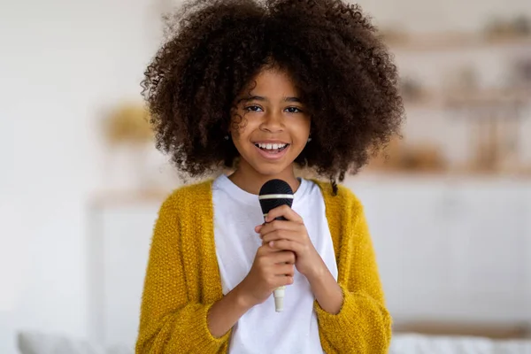 Adorable African American Preteen Girl Bushy Hair Holding Microphone Smiling — стокове фото
