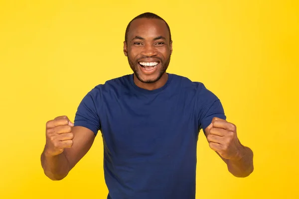 Joyful African American Guy Shaking Fists Smiling Camera Celebrating Success — Foto de Stock