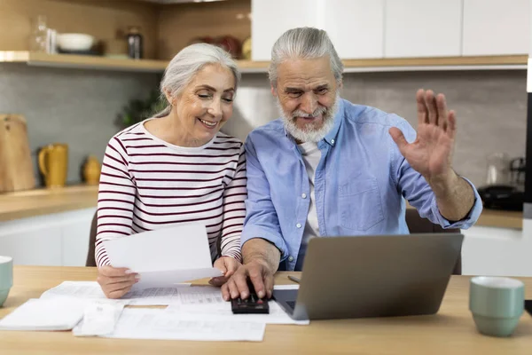 Happy Senior Spouses Making Video Call Accountant While Using Laptop —  Fotos de Stock