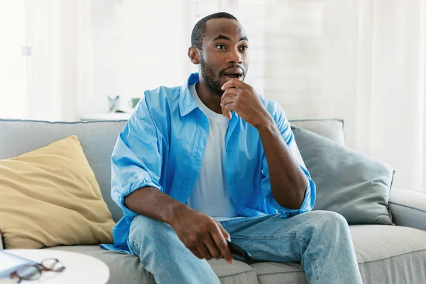 Watching Home Black Man Having Rest Switching Channels Remote Controller — Fotografia de Stock