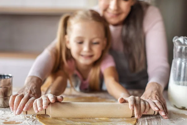 Smiling European Granddaughter Elderly Grandma Aprons Make Dough Rolling Pin — Fotografia de Stock