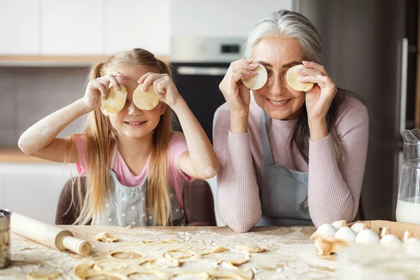 Happy European Little Girl Grandmother Prepare Cookies Dough Apply Eyes — Stok fotoğraf