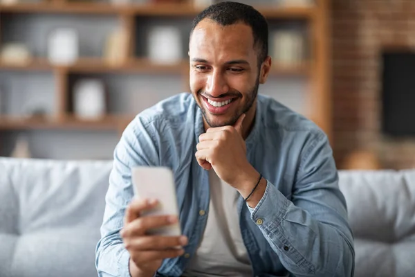 Handsome Young Black Man Looking Smartphone His Hand Smiling Happy — Stockfoto