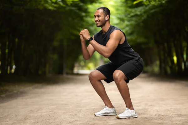 Positive Handsome Young Middle Eastern Guy Black Sportswear Having Workout — Φωτογραφία Αρχείου