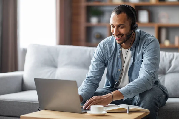 Distance Learning Smiling Black Millennial Man Headset Studying Laptop Home — 스톡 사진