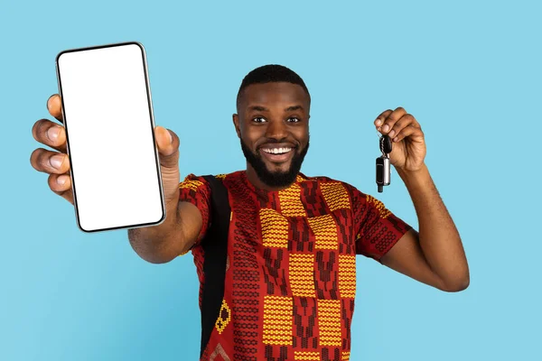 Happy African Man Holding Blank Smartphone Showing Car Key Camera — 图库照片