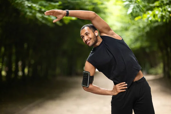 Happy Athletic Young African American Man Black Sportswear Exercising Outdoors — Stockfoto