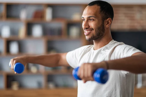 Sporty Lifestyle Smiling Young Black Male Training Dumbbells Home Muscular — Stockfoto